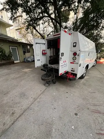 Magnet Plumbing service vehicle on-site for Grease Trap Cleaning in Cypress Reserve